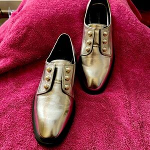 Gently worn silver shoes with pear accents